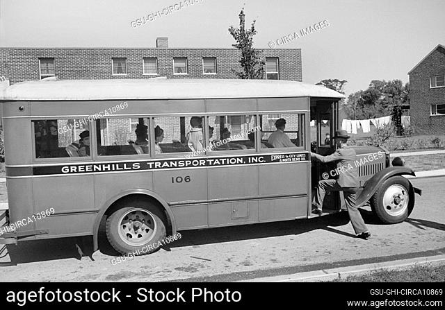 Bus traveling between Greenhills, a New Deal planned Community, and Cincinnati, Ohio, USA, John Vachon, U.S. Office of War Information/U.S