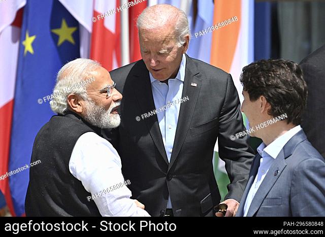 US President Joe BIDEN greets Narendra Damodardas Modi (Prime Minister of India), Shake Hands.Re:Justin TRUDEAU (Prime Minister of Canada)