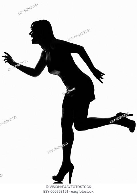stylish silhouette caucasian beautiful woman running happy full length on studio isolated white background