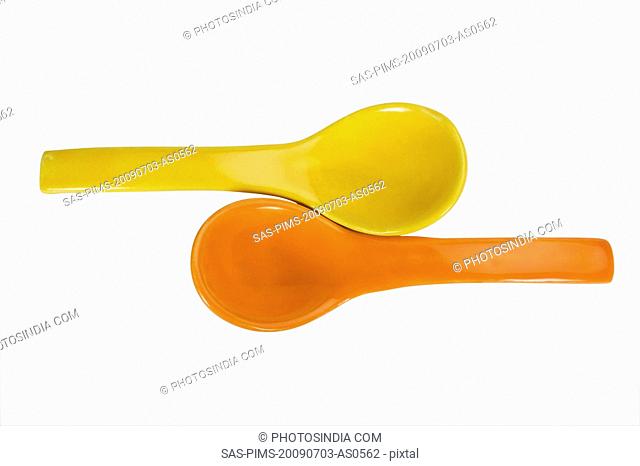 Close-up of two soup spoons