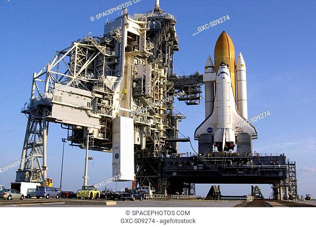 03/23/2002 -- On the launch pad, the payload canister with the S0 Integrated Truss Structure is lifted up the Rotating Service Structure to the payload...