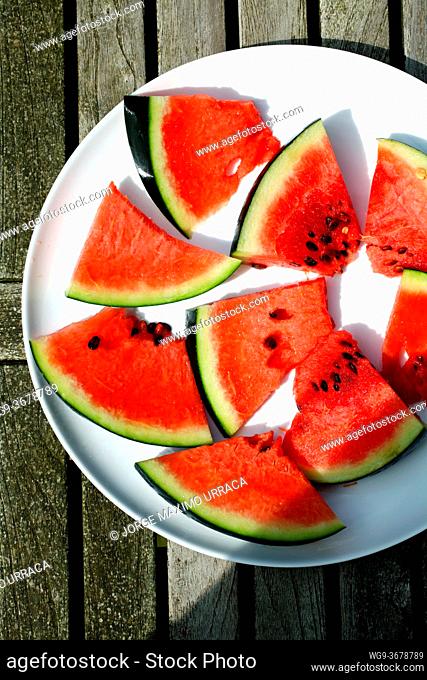 Watermelon plate on wooden table