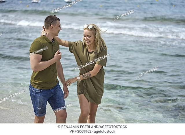 Happy young couple on the beach, Russian ethnicity, Hersonissos, Crete, Greece