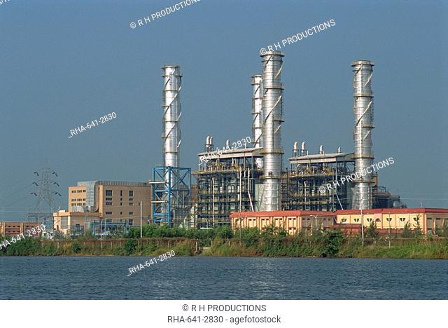 Chemical plant located on the Backwaters, Kerala state, India, Asia