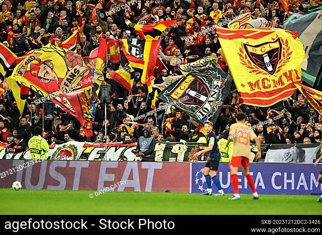 fans and supporters of Lens waving their flags during the Uefa Champions League matchday 6 game in group B in the 2023-2024 season between Racing Club de Lens...