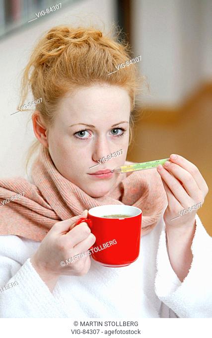 Young woman with a cup of tea. - BONN, GERMANY, 15/02/2005