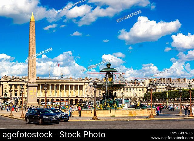 PARIS, FRANCE - JULY 14 2014: The Luxor Obelisk at the center of the Place de la Concorde in Paris in a summer day, July 14, 2014