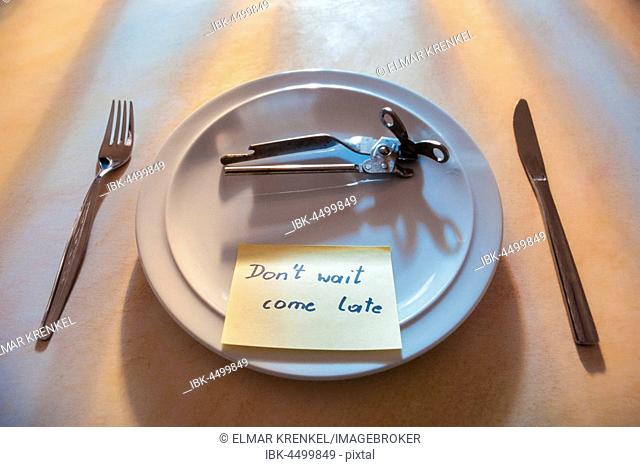 Empty plate with cutlery and a can opener, note, don't wait come late