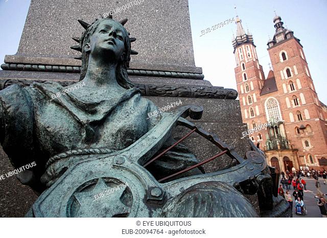 Stare Miasto Rynek Glowny. Detail of memorial statue of the Romantic poet Adam Mickiewicz designed by Teodor Rygier in 1898