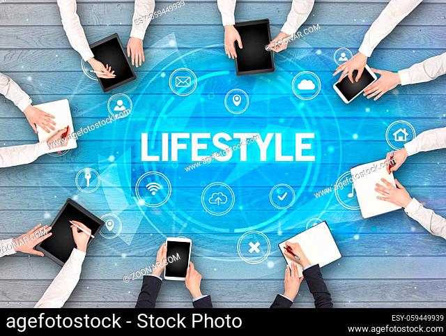 Group of people having a meeting with LIFESTYLE insciption, social networking concept