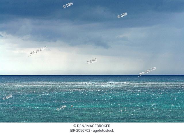 View of the ocean with approaching bad weather, Pointe aux Piments, Mauritius, Africa, Indian Ocean