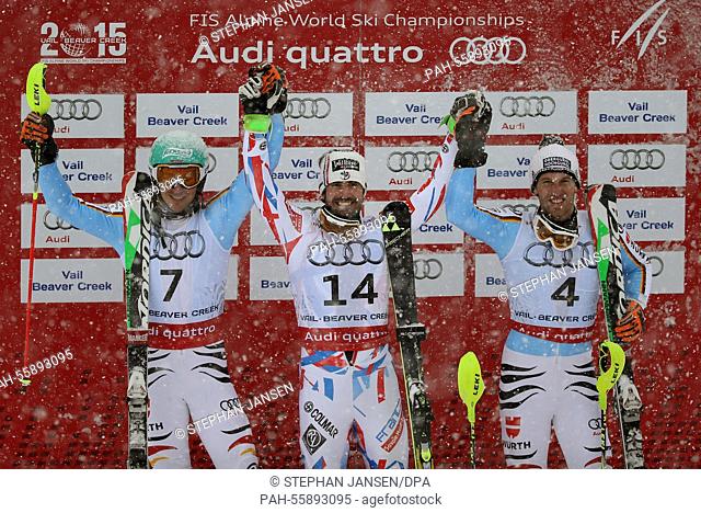(L-R) Fritz Dopfer of Germany, Jean-Baptiste Grange of France and Felix Neureuther of Germany react after the mens slalom at the Alpine Skiing World...