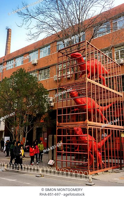Red dinosaurs sculpture by Sui Jianguo in Dashanzi Art District, Beijing, China, Asia