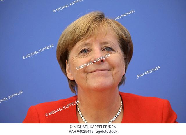 Chancellor Angela Merkel (CDU) laughs on 29.08.2017 in the Federal Press Conference in Berlin during her PC on current issues of domestic and foreign policy