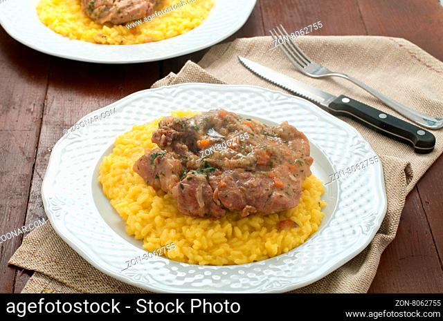marrowbone, veal cut used in Italian cooking with yellow risotto alla milanese with safran