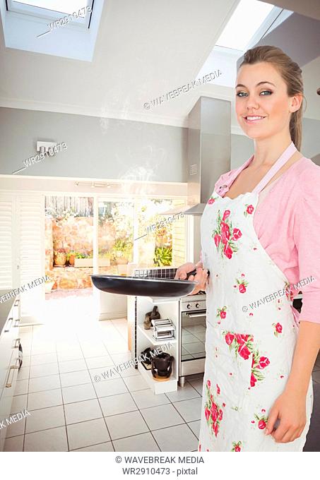 woman with frying pan