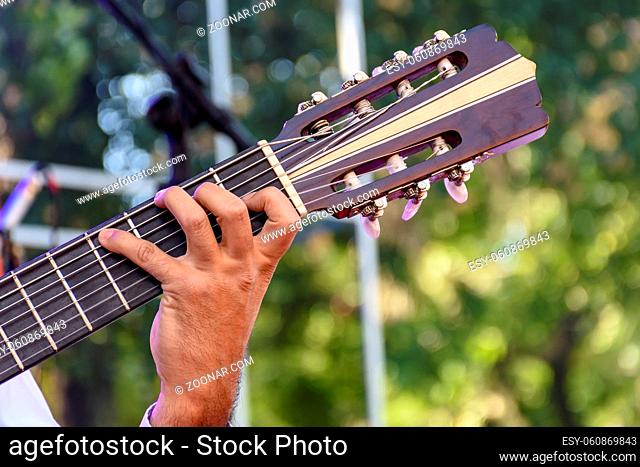 Live musical performance of Brazilian popular music with seven string acoustic guitar