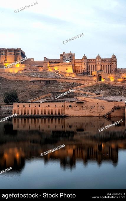 Sunset view over amer fort or amber fort taken across from maotha lake. Amer fort, Jaipur, India