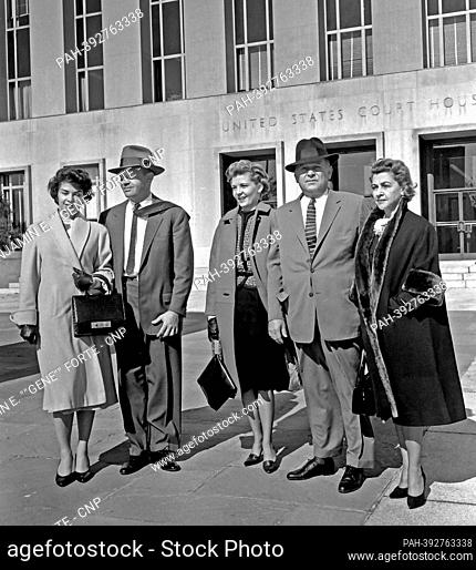 Frank Costello, second right, departs US District Court in Washington, DC on 17 February, 1960. The court was deciding a case to take away Mr