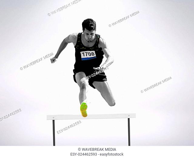 Sportsman practising hurdles