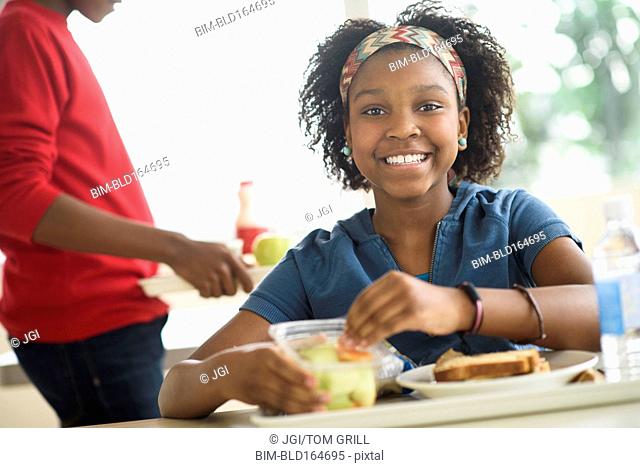 Black students eating lunch in school cafeteria