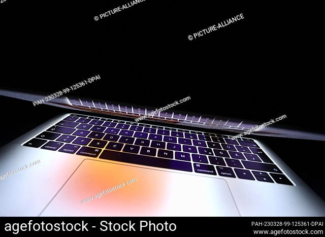 28 March 2023, Bavaria, Kempten: ILLUSTRATION - The keyboard of a laptop is reflected in its screen. Photo: Karl-Josef Hildenbrand/dpa