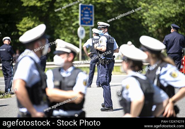 Border guards, police officers at the border crossing. Border controls at the German-Austrian border in Freilassing on May 18th, 2020