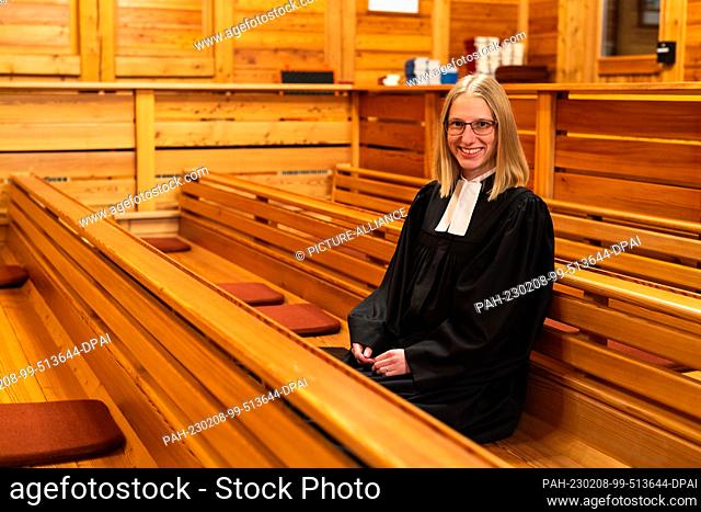 PRODUCTION - 01 February 2023, Baden-Württemberg, St. Blasien: Pastor Lisa Rudzki sits in the Lutheran Christuskirche. The clergywoman also plays a pastor...
