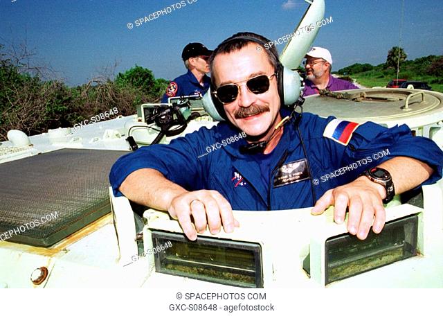 07/18/2001 -- Expedition Three crew member Mikhail Tyurin is ready to take the wheel of the M-113 armored personnel carrier that is part of emergency egress...