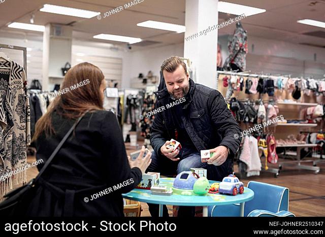 Couple shopping in department store