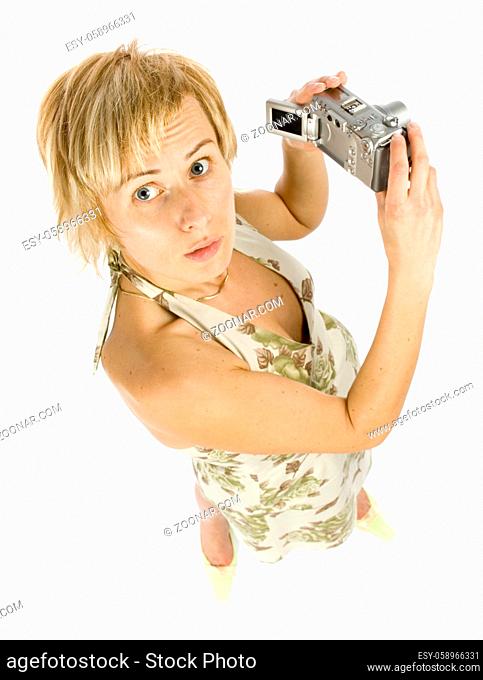 woman is holding digital camera
