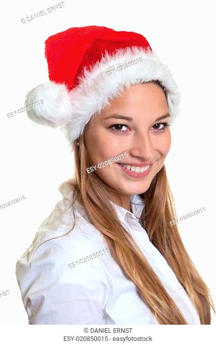 Portrait einer lachenden Frau mit roter Nikolausmütze