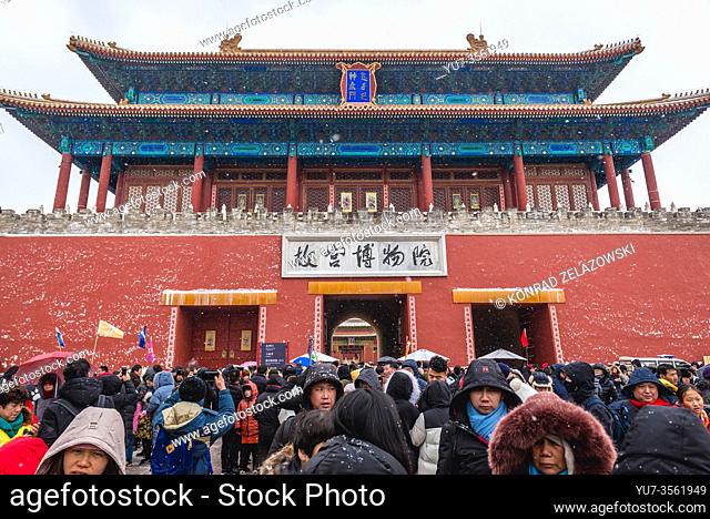 Tourists in front of Shenwumen - Gate of Divine Prowess also called Gate of Divine Might - northern gate of Forbidden City in Beijing, China