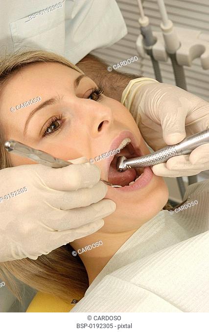WOMAN RECEIVING DENTAL CARE Photo essay from dental office