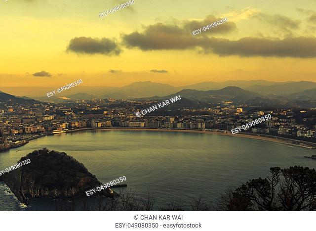 Aerial view of the resort town of San Sebastian in the mountainous Basque Country, Spain taken in the evening