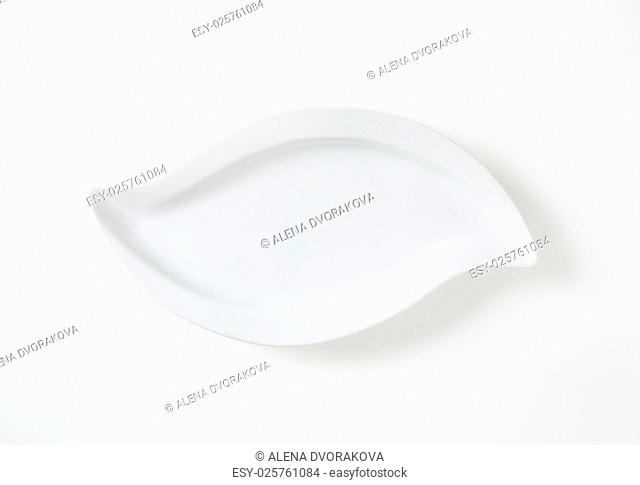 unusual shaped white bowl on white background
