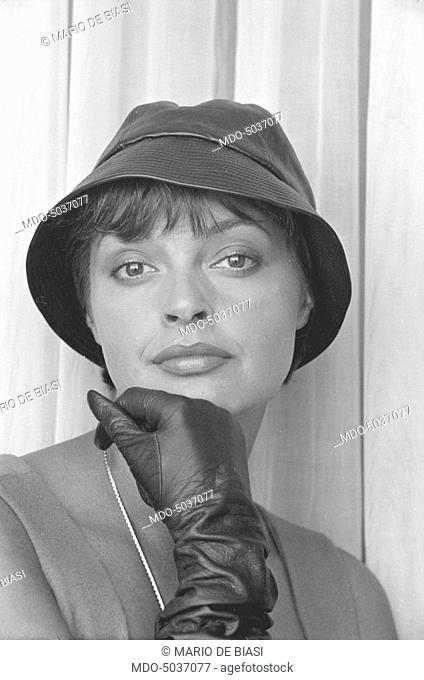 Austrian actress Nadja Tiller wearing a hat and leather gloves during the 19th Venice International Film Festival. Venice, August 1958