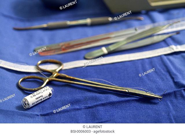 SURGICAL INSTRUMENT<BR>Photo essay.<BR>Essay on dental implants