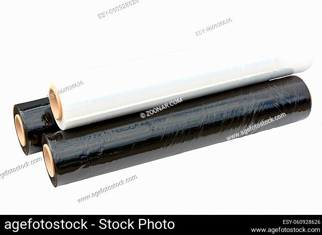Three rolls of stretch film packaging black and transparent. Wrapping film. Isolated on white background