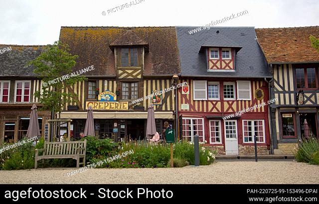 10 June 2022, France, Beuvron-en-Auge: View of half-timbered houses with restaurants and cafes. Photo: Hauke Schröder/dpa-Zentralbild/dpa