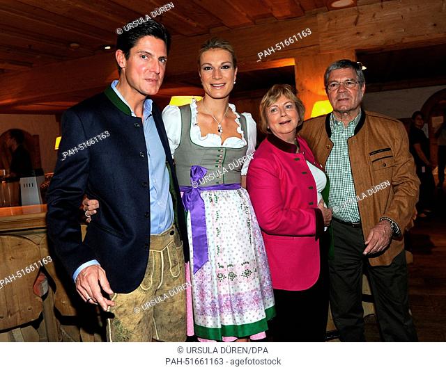 Former ski racer Maria Hoefl-Riesch (2ND-L), her husband Marcus Hoefl (L) and his parents Annerl and Herbert Höfl are pictured during the gala on occasion of...