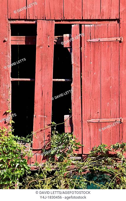 Weathered Red Broken Barn Window of New Jersey
