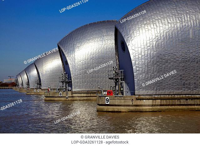 England, London, Woolwich. The Thames Barrier, the world's second largest movable flood barrier, on the River Thames