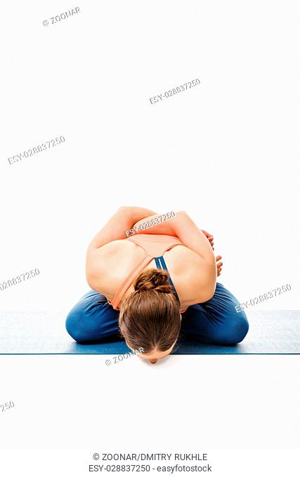 Woman doing asana Yoga mudrasana