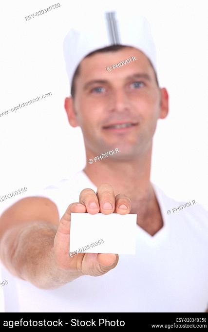 Chef holding businesscard