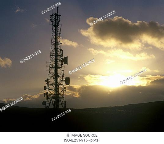 Communication tower at sunrise