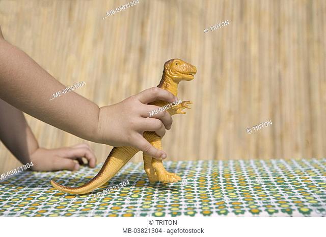 Table, child, detail, hands, Spielzeugfigur,  Dinosaurs, Tyrannosaurus Rex, ,  plays,  Tablecloth, toddler, child hand, holds, toy, game animal, plastic figure