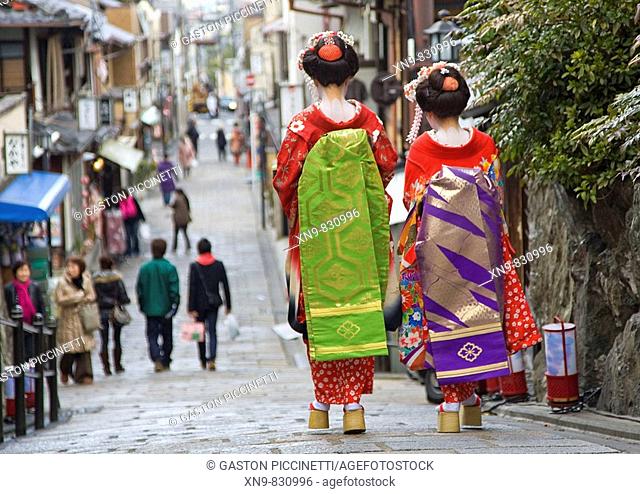 Geishas walking in Gion area, Kyoto, Japan