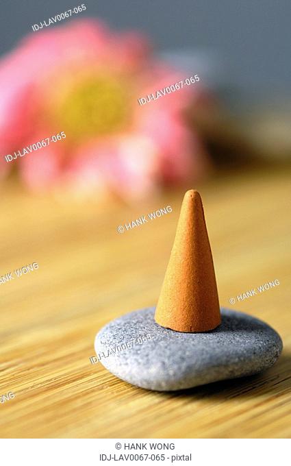 Incense on a pebble