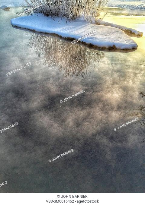 Steam rising from Lake Harriet in Minneapolis, Minnesota USA on a very cold winter morning